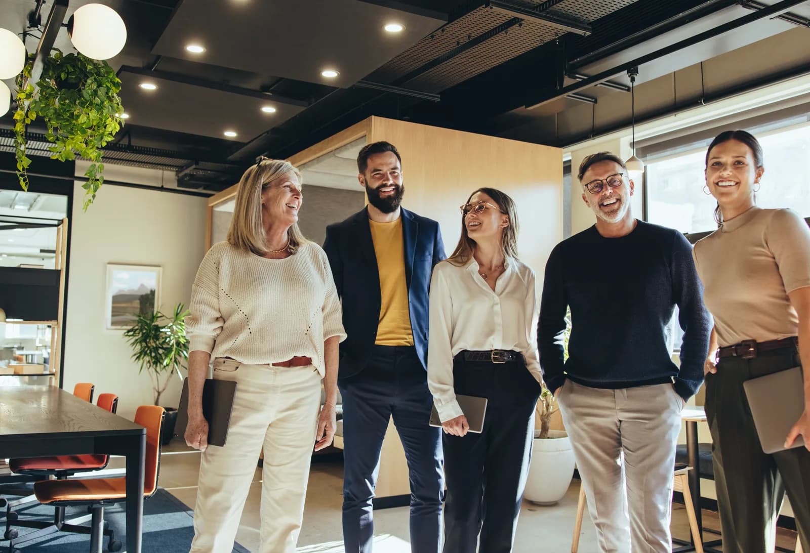SmartVantage advisory team collaborating in a modern office